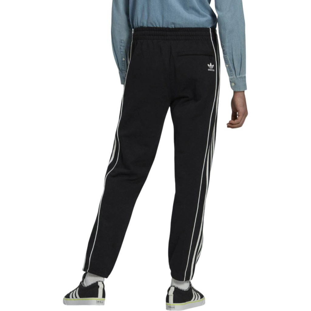 Pantalón adidas Rekive