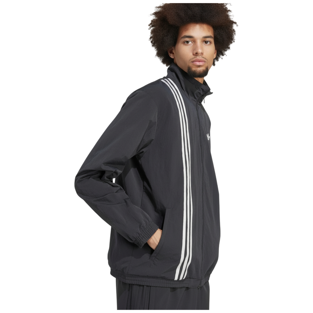 Chaqueta Adidas Firebird bandas frontales tejido técnico